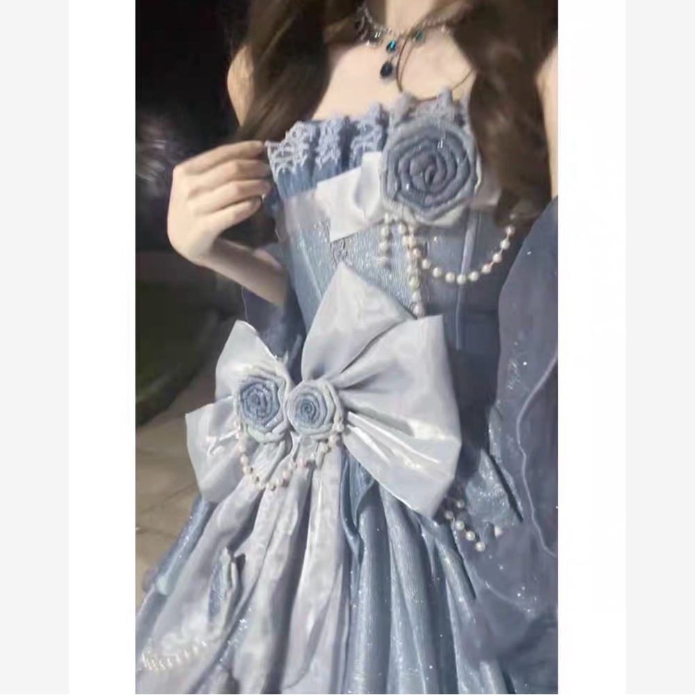 Elegant Blue Gown with Floral Accents - Picture 2 of 10